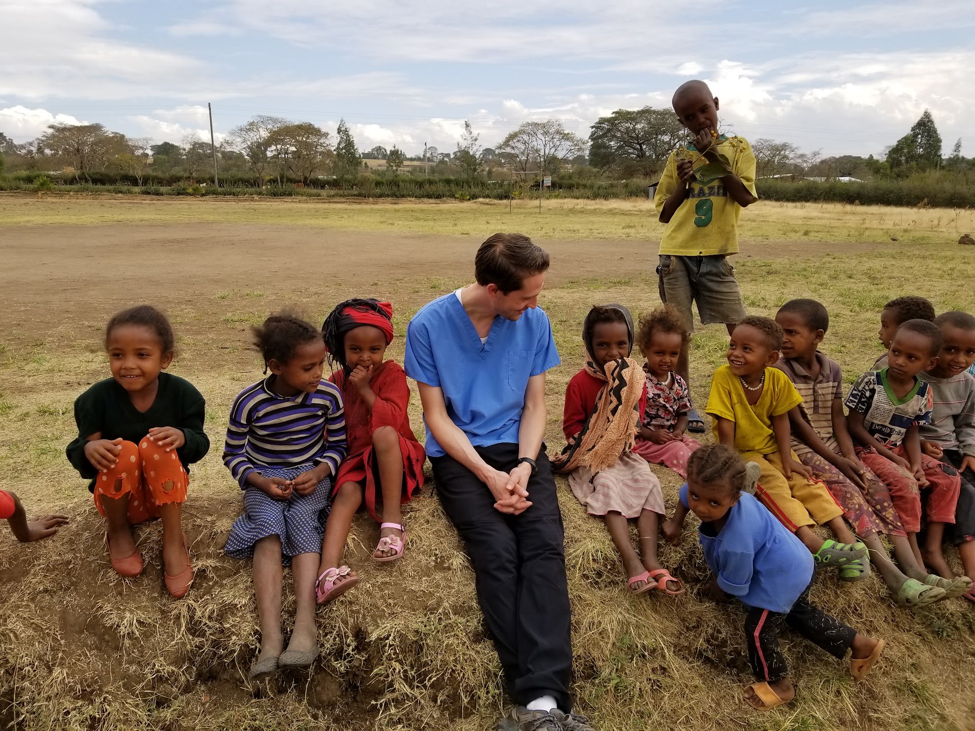 Dr. Ord with children he cared for in mission trip to Ethiopia